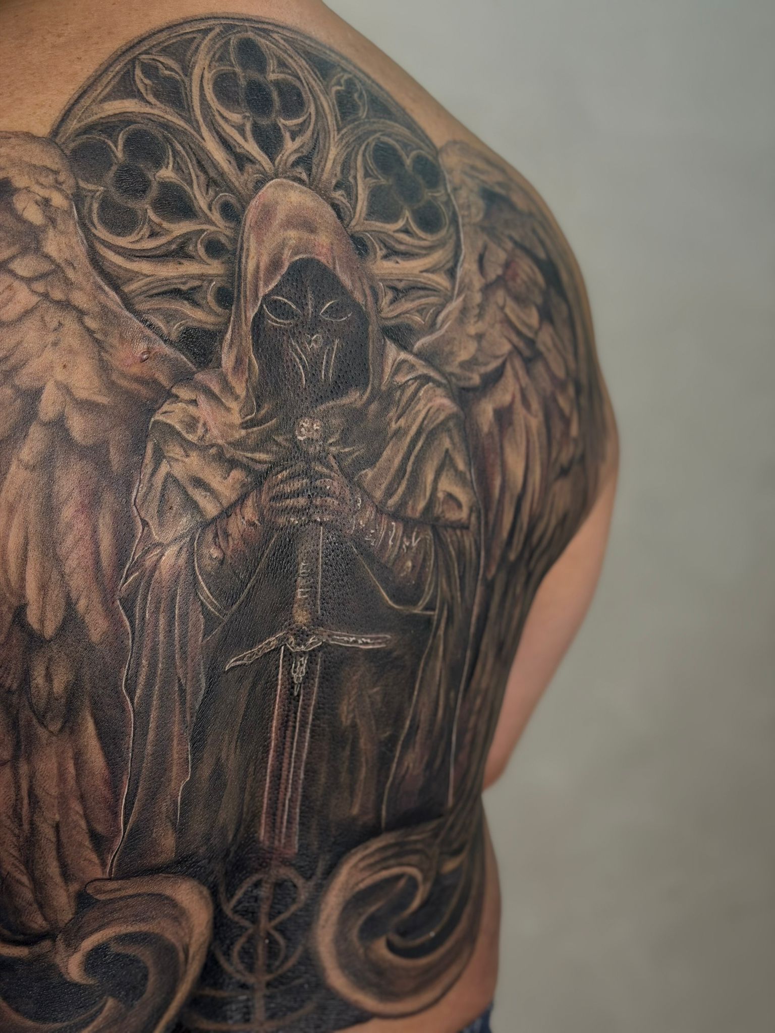 Large back guardian black and grey tattoo by HIM